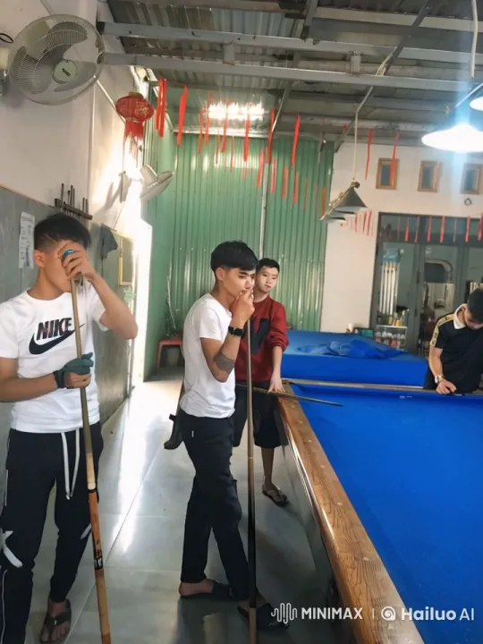 Young Men Enjoying a Casual Game of Pool – AI Generated Video | Hailuo AI