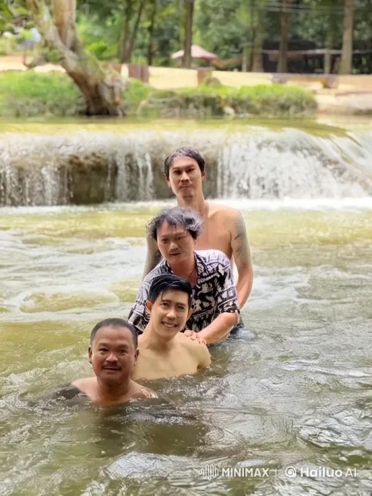 Martial Arts Display in River with Waterfall Backdrop – AI Generated Video | Hailuo AI