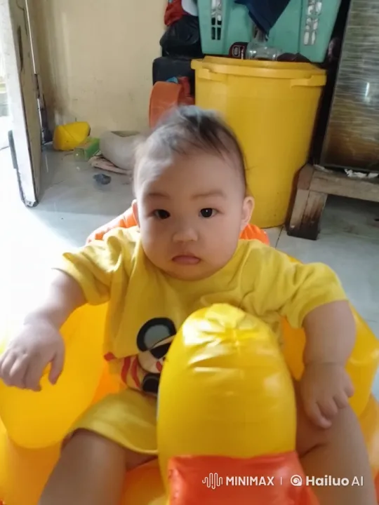Baby Mimics Kung Fu in Inflatable Seat – AI Generated Video | Hailuo AI