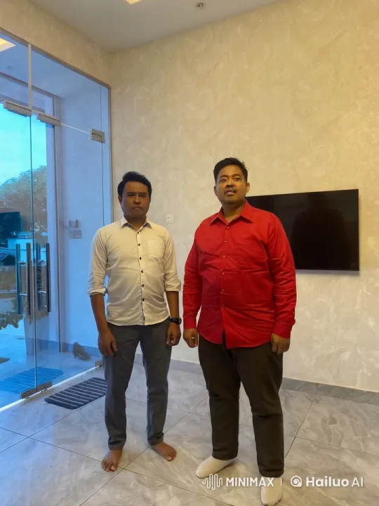 Two Men Display Martial Arts Skills in Modern Room – AI Generated Video | Hailuo AI