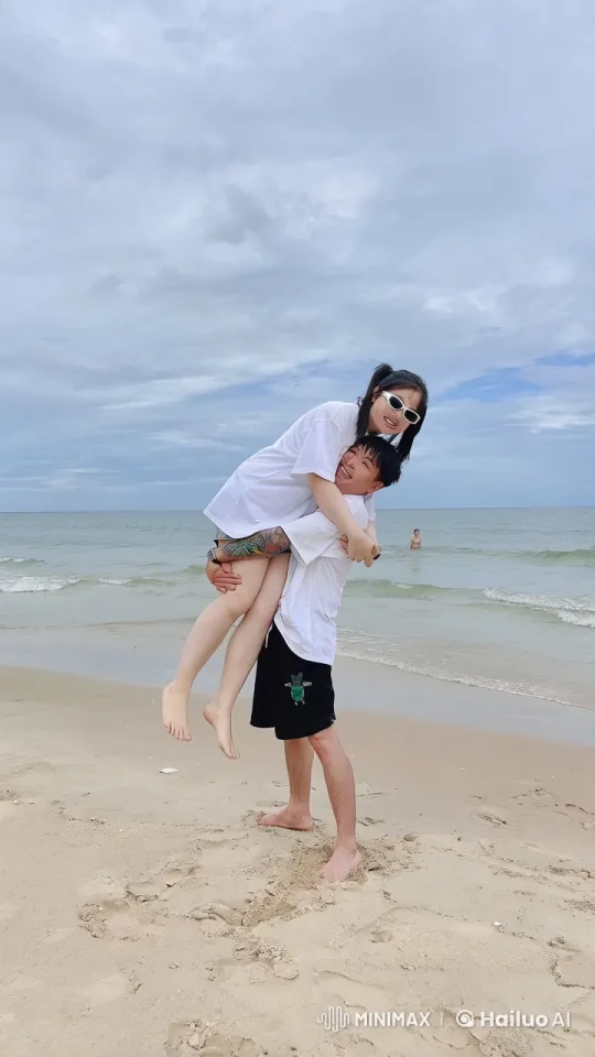 Couple Practices Playful Kungfu on Serene Beach – AI Generated Video | Hailuo AI