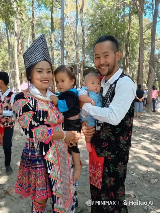 Family in Traditional Attire at Cultural Event in Forest – AI Generated Video | Hailuo AI