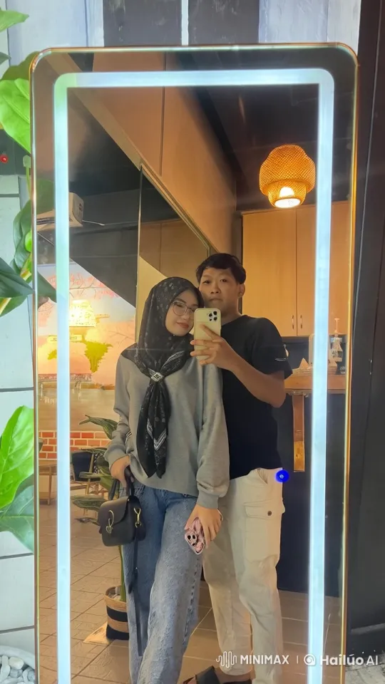 Couple's Stylish Mirror Selfie Turns into Martial Arts Display – AI Generated Video | Hailuo AI