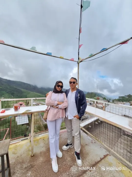 Couple Performing Kung-Fu on Rooftop with Mountain View – AI Generated Video | Hailuo AI