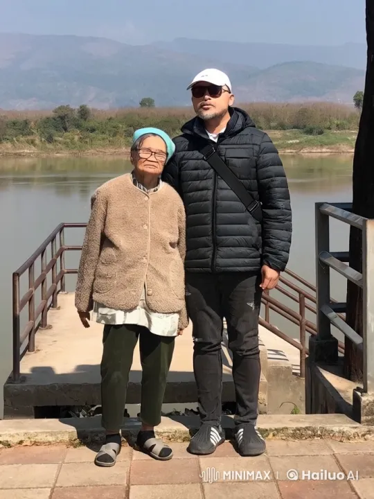 Elderly and Adult Engage in Energetic Kung Fu by the River – AI Generated Video | Hailuo AI