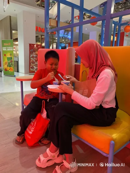 Young Boy and Woman Practice Kung-Fu in Shopping Mall – AI Generated Video | Hailuo AI