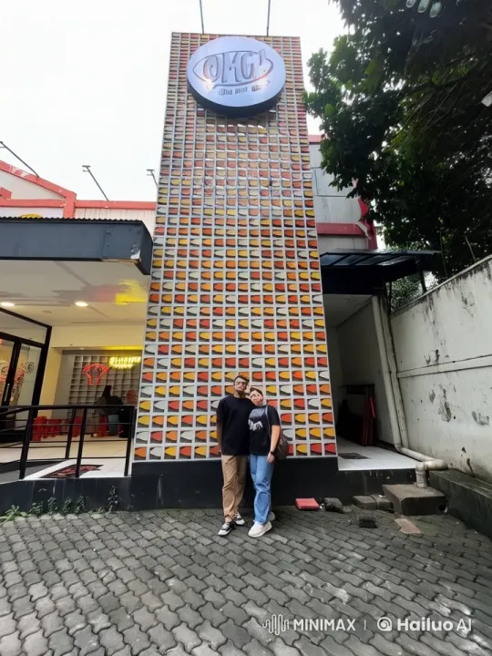 Live2D Animation: Couple Practicing Kungfu in Front of 'OMG Oh My Grill' Wall – AI Generated Video | Hailuo AI