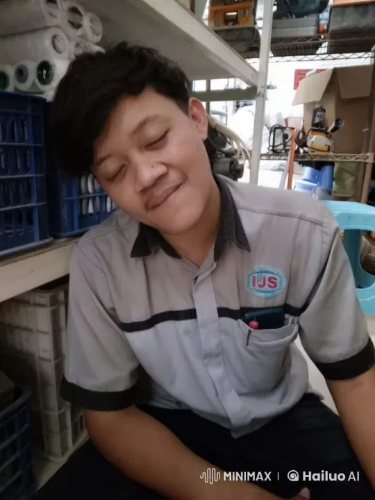 Worker Resting in Industrial Storage Area – AI Generated Video | Hailuo AI