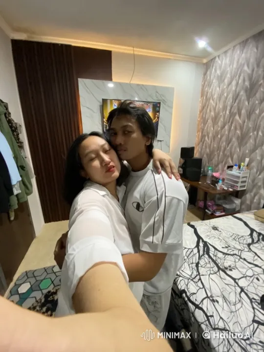 Couple Shares Intimate and Playful Moment in Bedroom – AI Generated Video | Hailuo AI