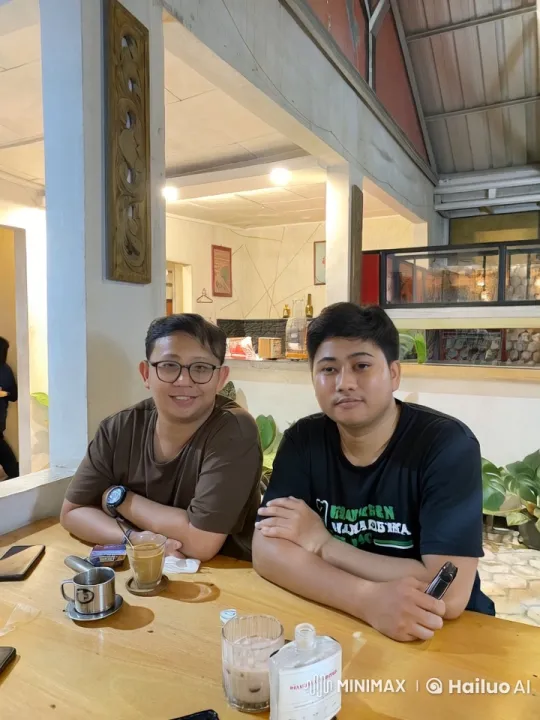 Friends Enjoying Drinks at a Cozy Café – AI Generated Video | Hailuo AI
