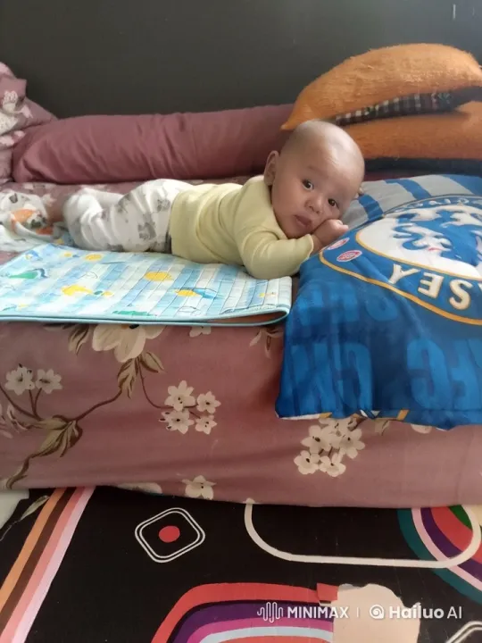 Baby's Gentle Movements in Cozy, Colorful Nursery – AI Generated Video | Hailuo AI