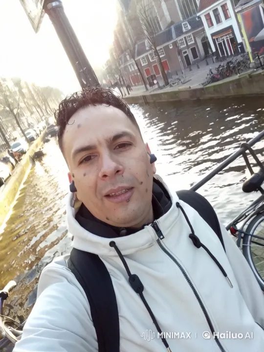 Magical Realism in Amsterdam's Serene Canal Scene – AI Generated Video | Hailuo AI