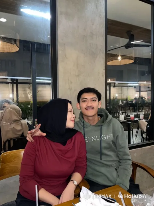 Couple Enjoying a Cozy Moment in a Cafe – AI Generated Video | Hailuo AI
