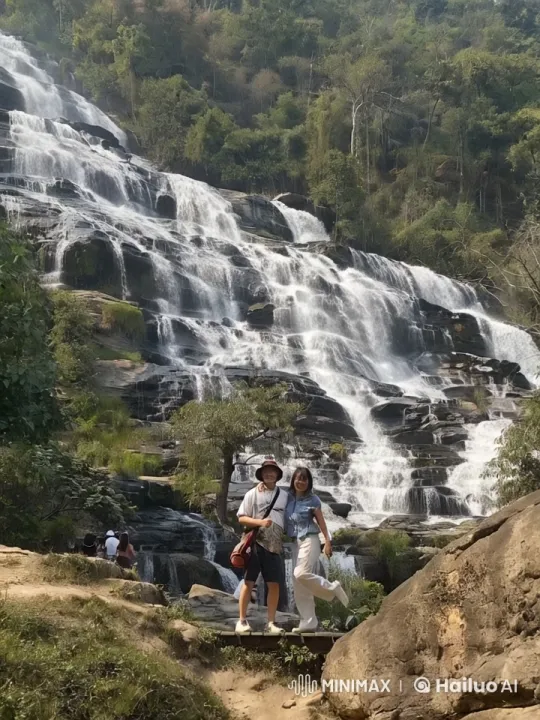 Couple Poses by Majestic Forest Waterfall – AI Generated Video | Hailuo AI