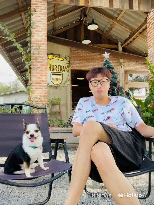 Young Person Practicing Kung Fu in Café with Excited Dog – AI Generated Video | Hailuo AI