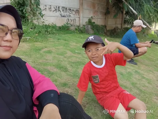 Boy Practices Kung Fu in Park with Observer – AI Generated Video | Hailuo AI