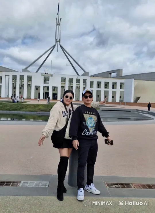 Martial Arts Duo Battles in Front of Government Building – AI Generated Video | Hailuo AI
