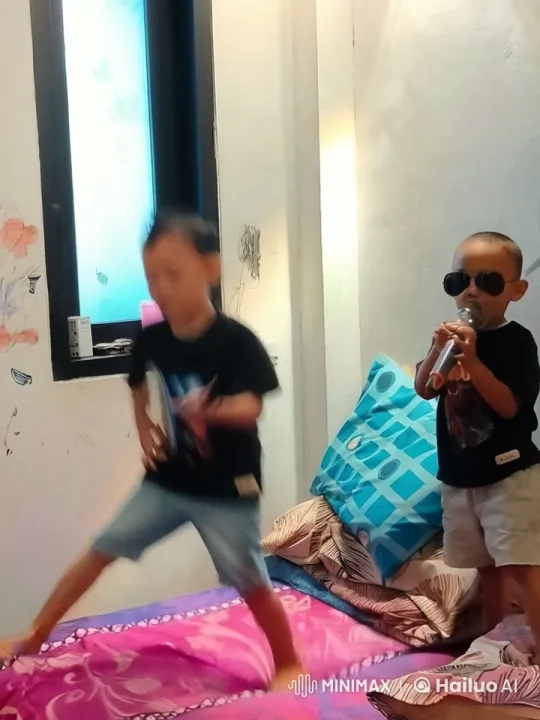 Children Enact Playful Kung Fu on Bed – AI Generated Video | Hailuo AI