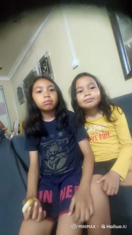 Children Playfully Mimic Martial Arts on Couch – AI Generated Video | Hailuo AI