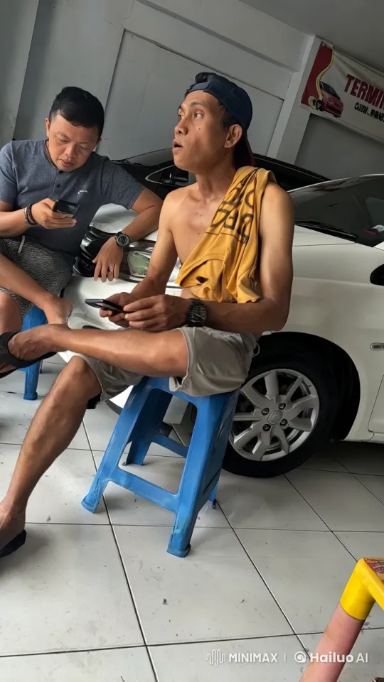 Two Men Relaxing and Shadow Boxing in a Garage – AI Generated Video | Hailuo AI