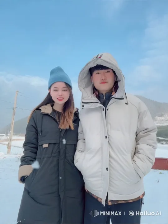 Couple Demonstrates Synchronized Kung Fu in Snowy Landscape – AI Generated Video | Hailuo AI