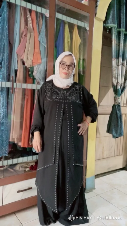 Elderly Woman Showcases Kung Fu Skills in Colorful Wardrobe Setting – AI Generated Video | Hailuo AI