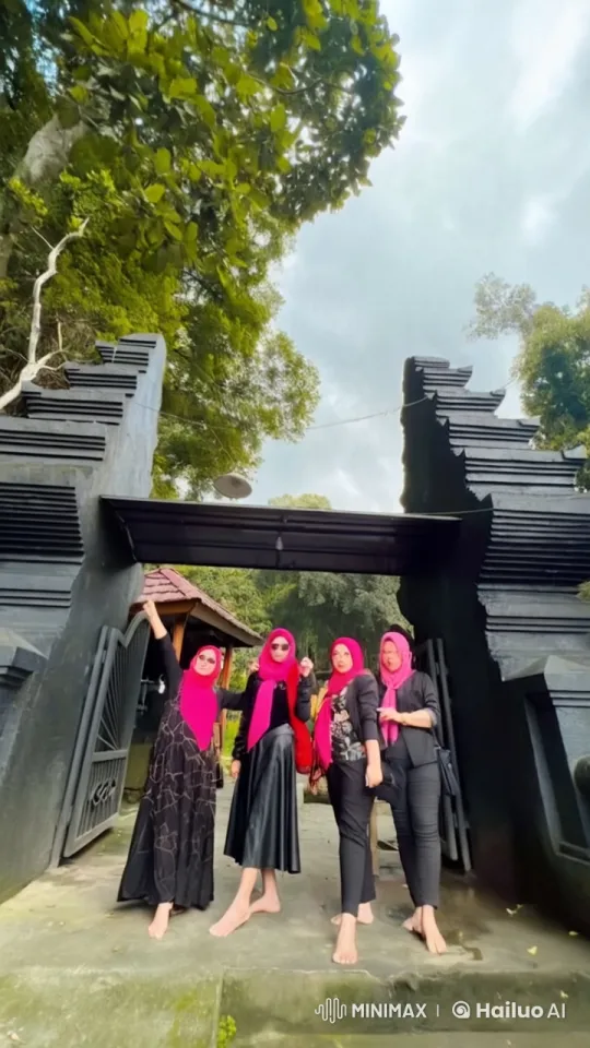 Women in Pink Headscarves Perform Kungfu at Stone Gate – AI Generated Video | Hailuo AI