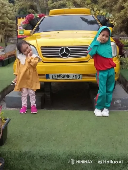 Children Perform Playful Kung Fu in Front of Yellow Mercedes – AI Generated Video | Hailuo AI