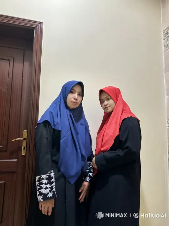 Women in Hijabs Perform Kung Fu in Hallway – AI Generated Video | Hailuo AI
