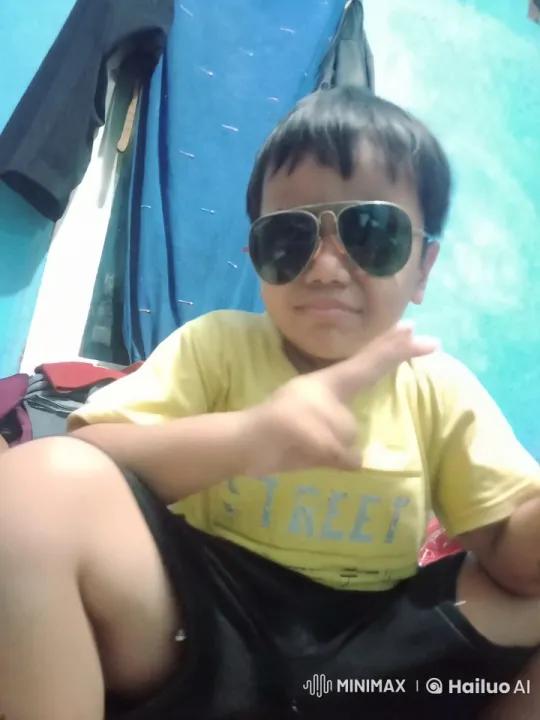 Boy Demonstrates Agile Martial Arts in Small Room – AI Generated Video | Hailuo AI