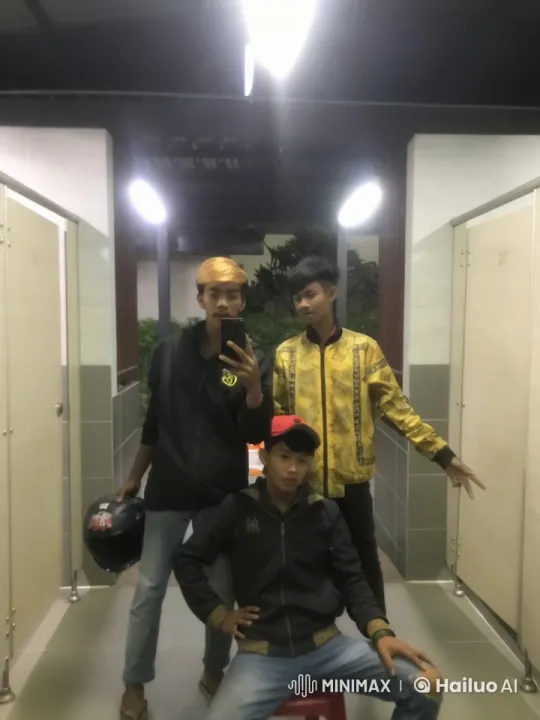 Three Young Men Stylishly Pose in Indoor Restroom Area – AI Generated Video | Hailuo AI
