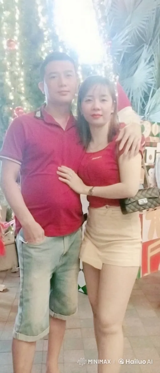 Couple Enjoying Festive Christmas Tree Scene – AI Generated Video | Hailuo AI