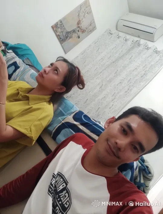 Young Couple Shares Intimate Moment in Cozy Bedroom – AI Generated Video | Hailuo AI