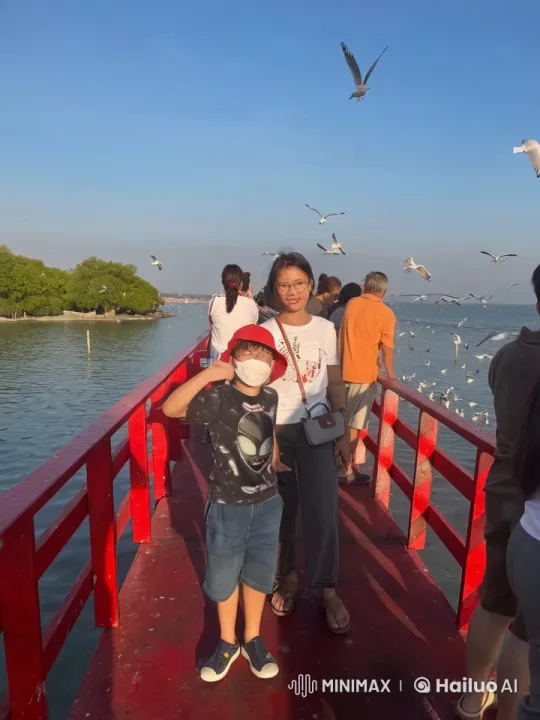 Child Practicing Kung Fu on Pier with Scenic Backdrop – AI Generated Video | Hailuo AI