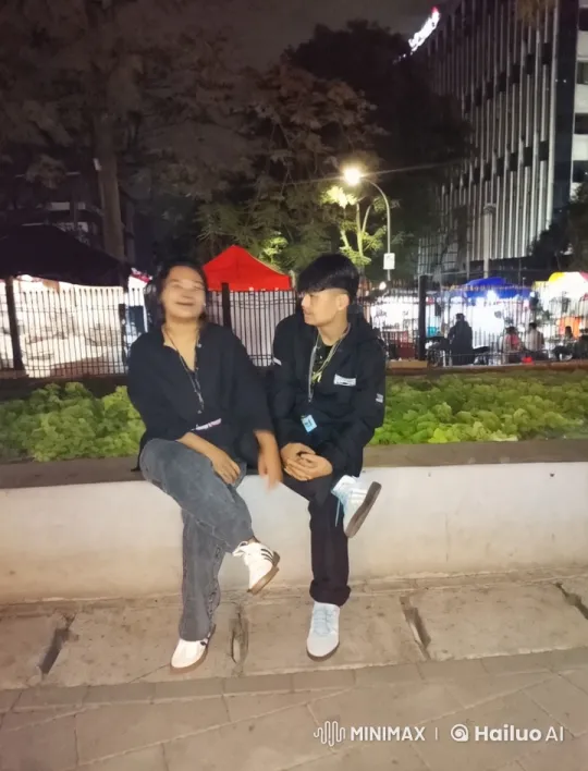 Urban Kung Fu Display in Lively Night Setting – AI Generated Video | Hailuo AI