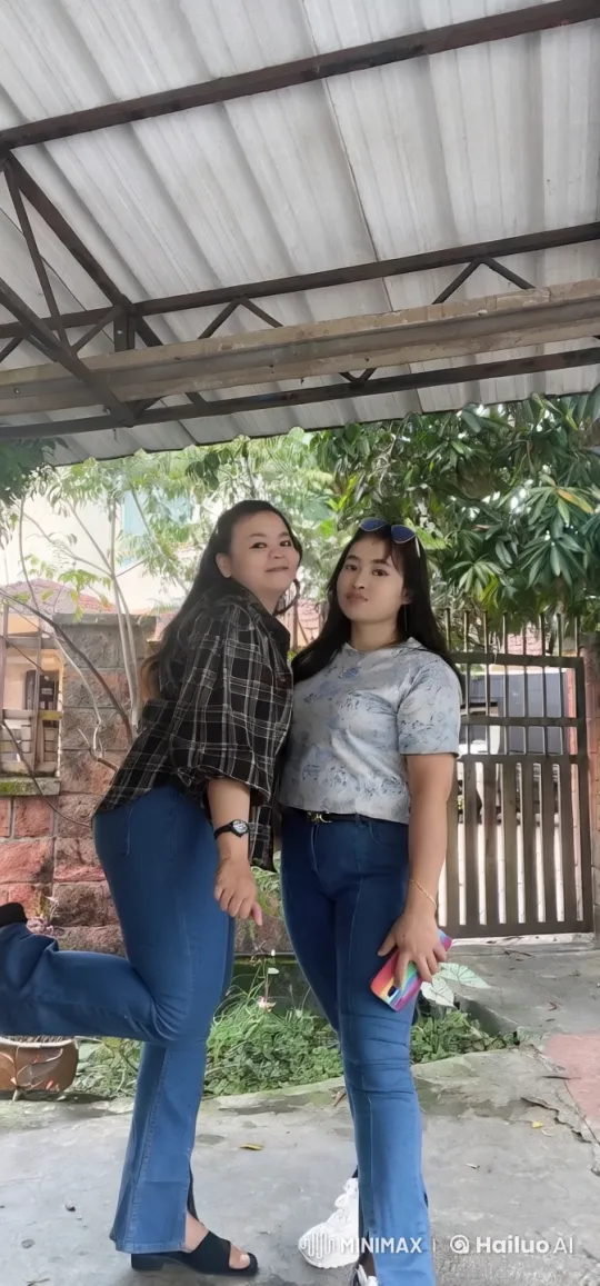 Two Friends Cheerfully Pose Under a Metal Roof – AI Generated Video | Hailuo AI