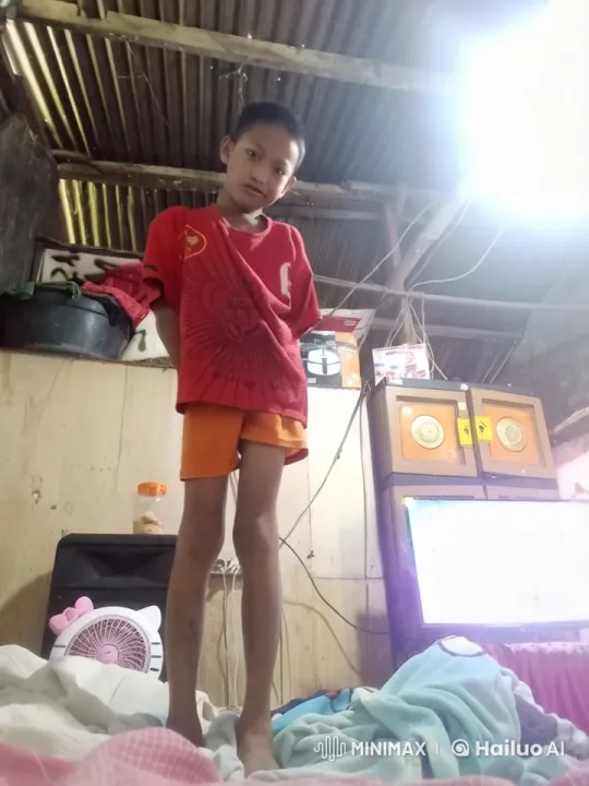 Boy Practices Kung Fu in Modest Bedroom – AI Generated Video | Hailuo AI