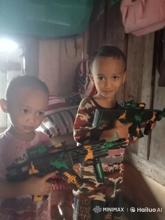 Boys Play Kung Fu with Toy Guns in Cozy Room – AI Generated Video | Hailuo AI