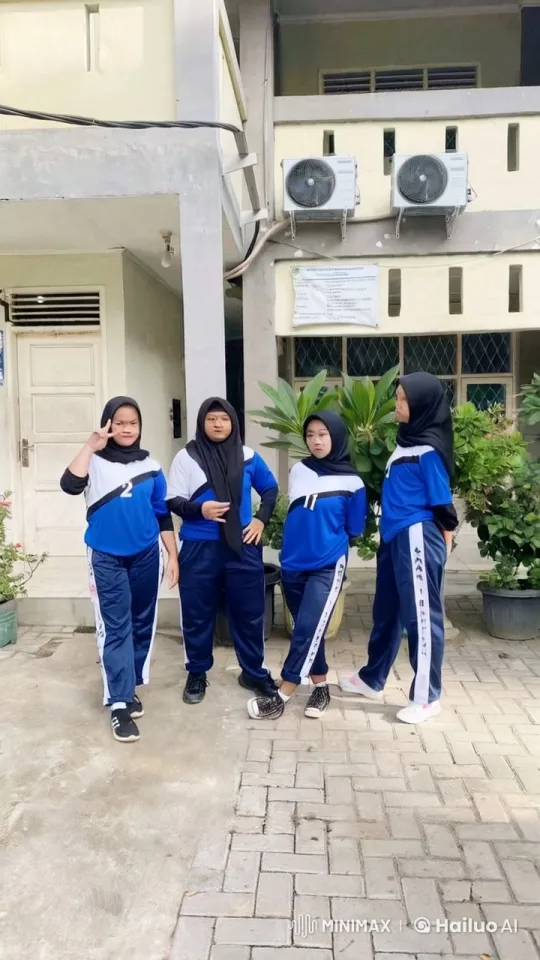 Four Individuals Practicing Kungfu in Front of a Building – AI Generated Video | Hailuo AI