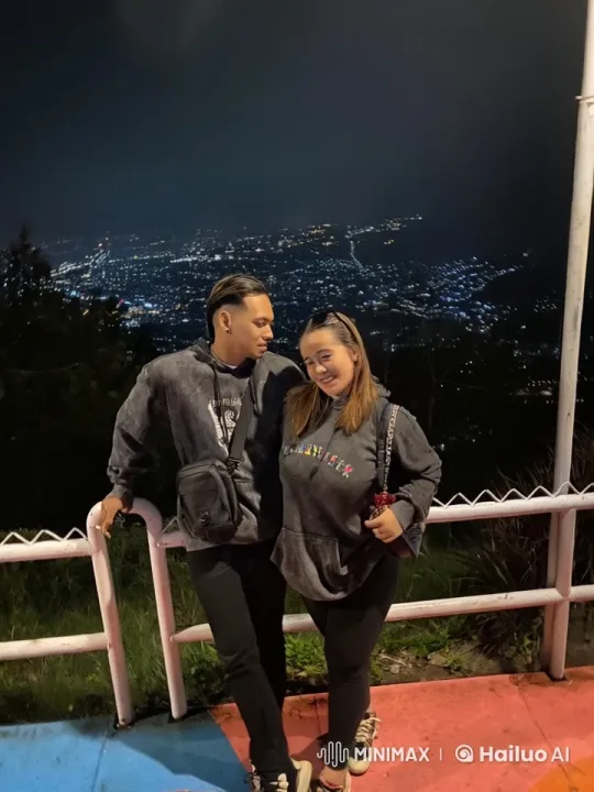 Couple Enjoying Romantic Night View Over City – AI Generated Video | Hailuo AI