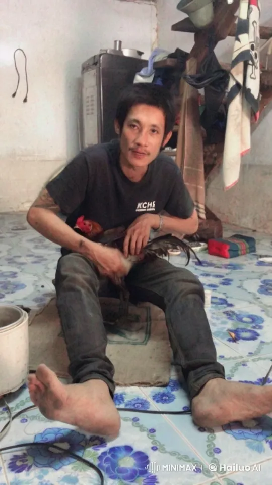 Man Grooms Rooster in Modest Room Setting – AI Generated Video | Hailuo AI