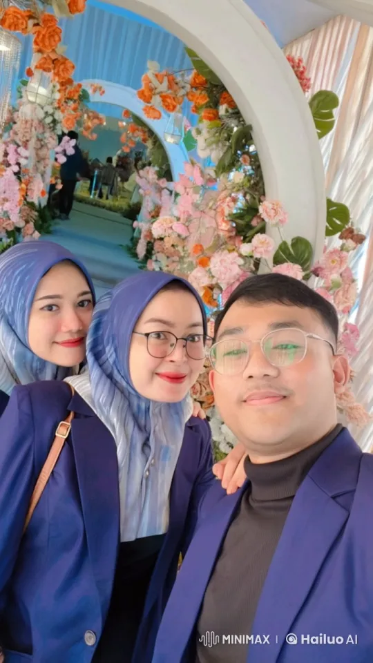 Blazer-Wearing Trio Showcases Martial Arts Under Floral Arch – AI Generated Video | Hailuo AI