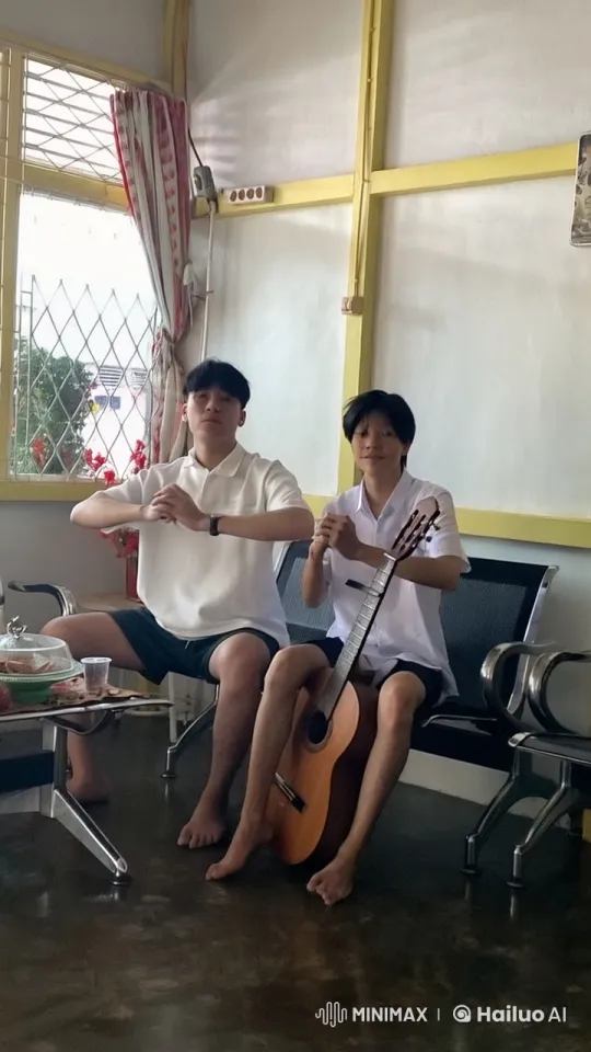 Young Men Practice Kung Fu and Guitar in Cozy Room – AI Generated Video | Hailuo AI