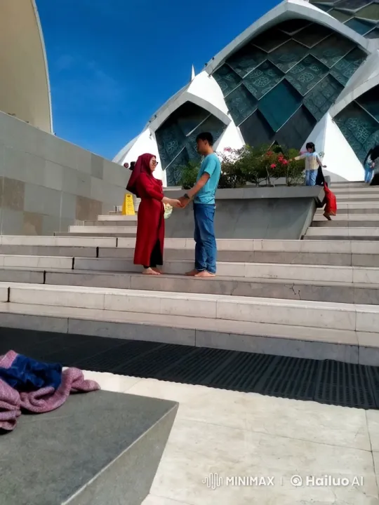 Couple Performs Synchronized Kungfu in Front of Modern Architecture – AI Generated Video | Hailuo AI