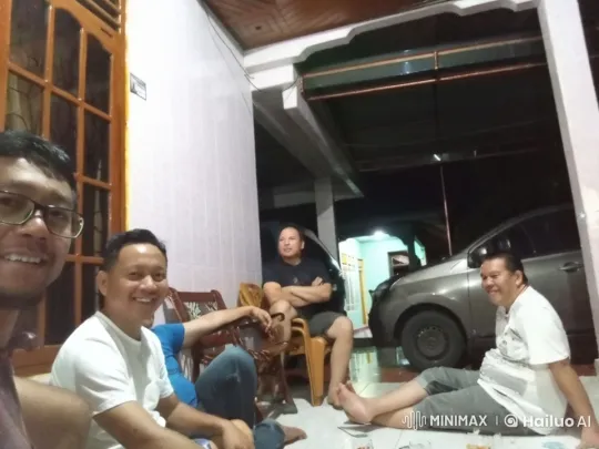 Nighttime Social Gathering in Outdoor Covered Area – AI Generated Video | Hailuo AI