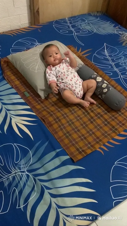 Baby Mimics Kung-Fu Moves on Colorful Bed – AI Generated Video | Hailuo AI