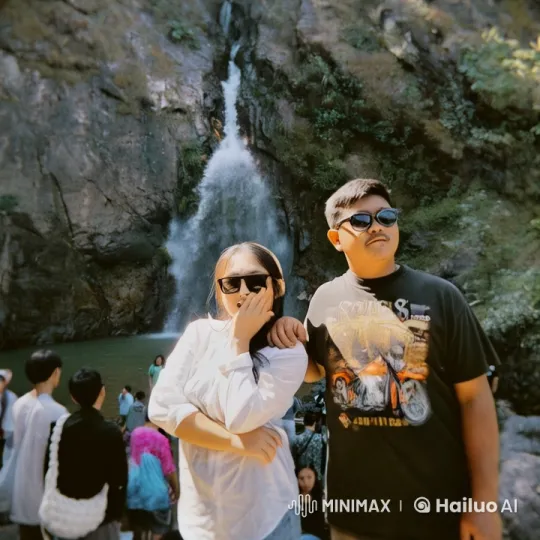 Casual Attired Fighters Engage in Intense Martial Arts at Waterfall – AI Generated Video | Hailuo AI