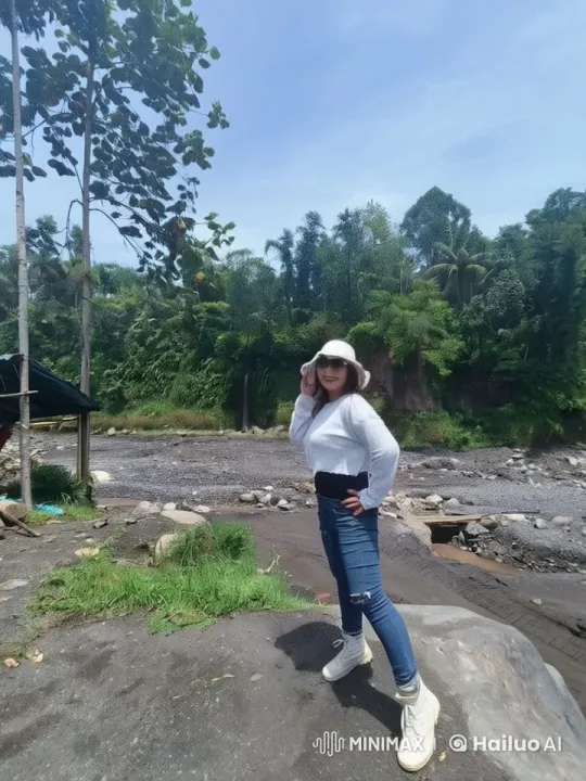 Young Woman Performing Dynamic Kungfu Jump in Scenic Setting – AI Generated Video | Hailuo AI