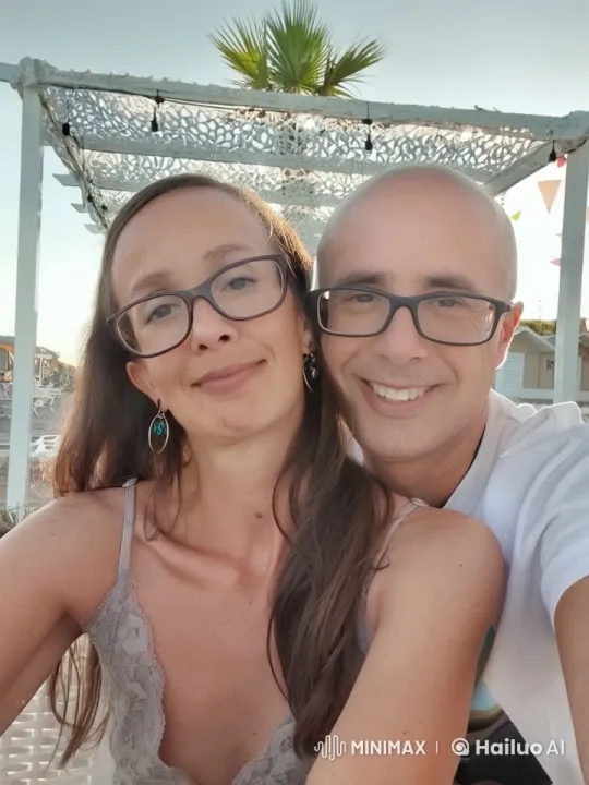Intimate Couple Embraces Under Serene Outdoor Canopy – AI Generated Video | Hailuo AI