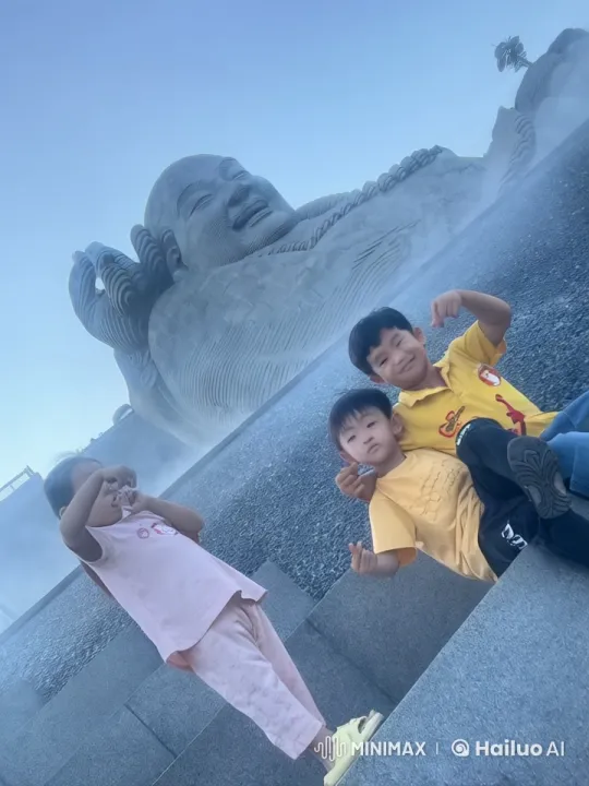 Children's Playful Martial Arts in Front of Buddha Statue – AI Generated Video | Hailuo AI